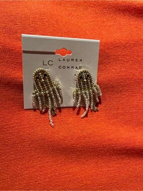 LC Lauren Conrad white and gold colored Ghost dangle Earrings